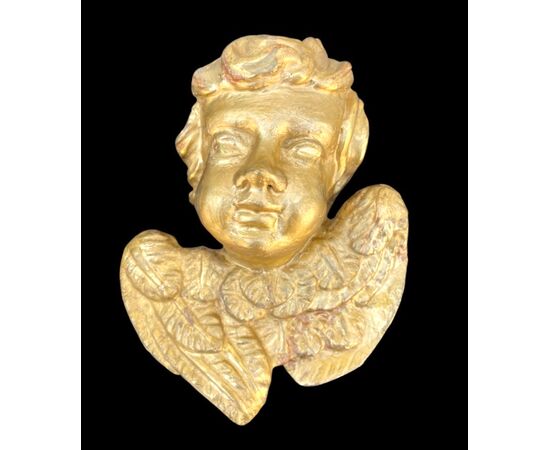 Two figures of cherubs in carved wood and gold leaf Liguria.     
