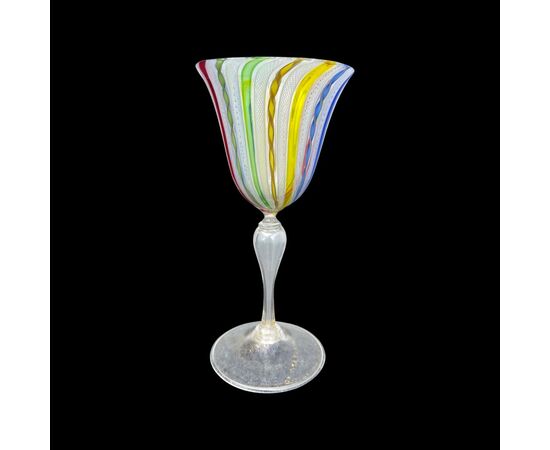 Goblet in zanfirico and aventurine polychrome glass with gold leaf. A.Ve.M Murano manufacture.     