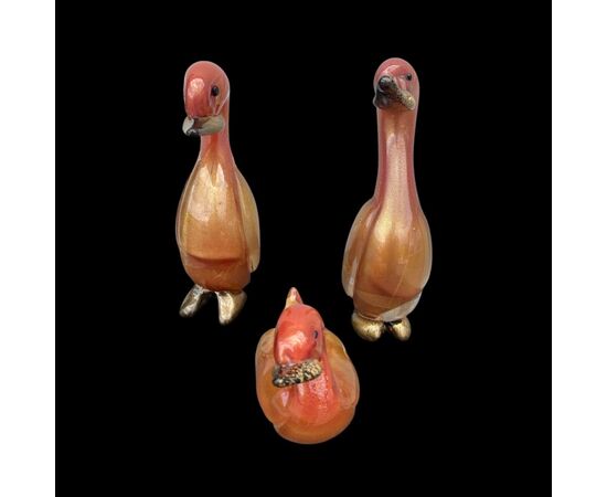Family of three ducks in heavy sommerso glass with gold leaf.Barbini manufacture, Murano.     