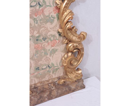 Gilded and lacquered frieze with ancient fabric, 18th century     