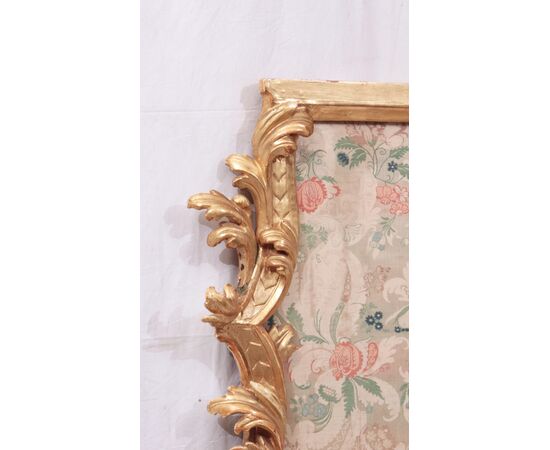 Gilded and lacquered frieze with ancient fabric, 18th century     