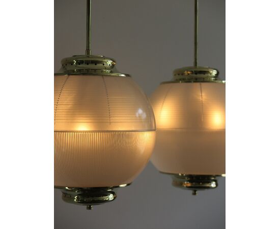 Pair of chandeliers "L/273", in brass and glass, design Chiaravallotti, 60s