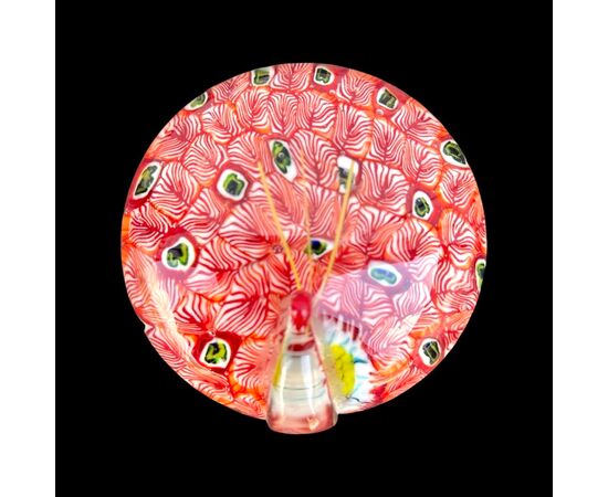 Press Papier in heavy sommerso glass with flattened murrine with a stylized snail figure.Murano.     