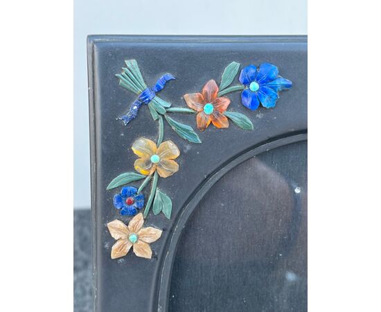Chalkboard stone frame with micromosaic floral motifs in semi-precious stones in relief. Florence.     