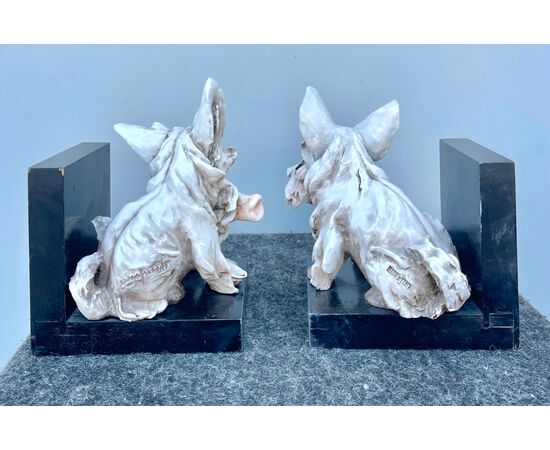 Pair of bookends in earthenware with wooden structure.Manufactured by Guido Cacciapuoti.Milan.     