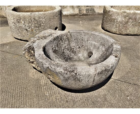 Holy water stoup in stone from the early 700s
