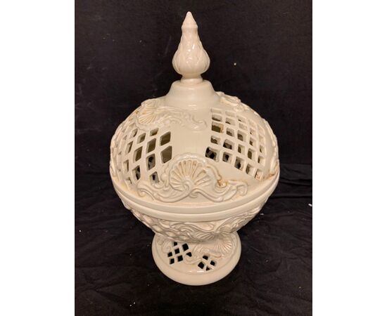 Ancient perforated ceramic cup     