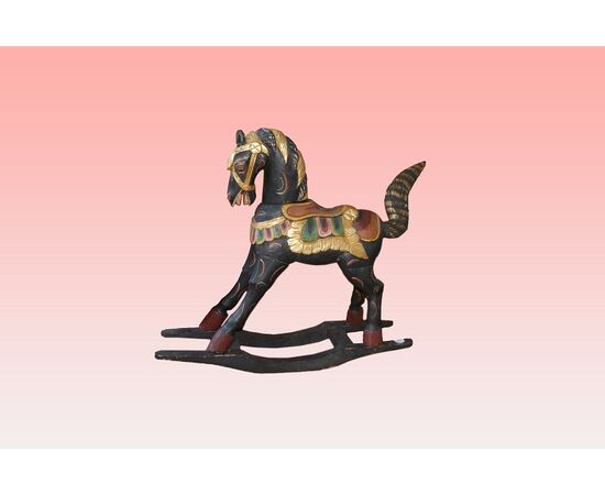 Small richly painted rocking horse from the 1800s     