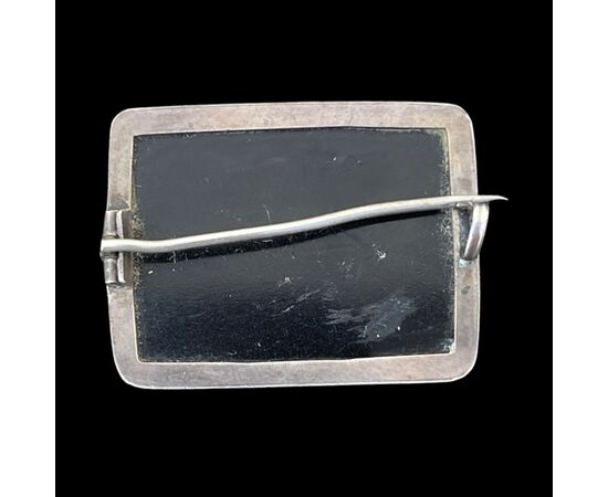 Small silver brooch with micromosaic depicting Roman ruins. Rome.     