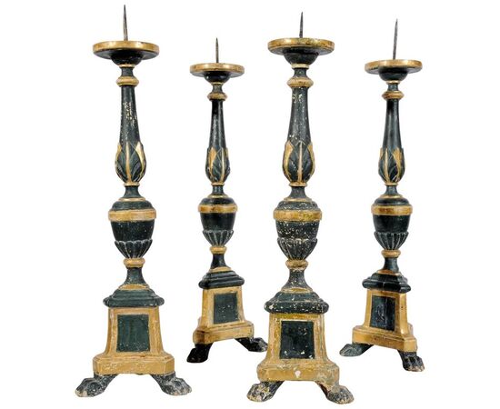Series of four ancient Italian wooden candlesticks     