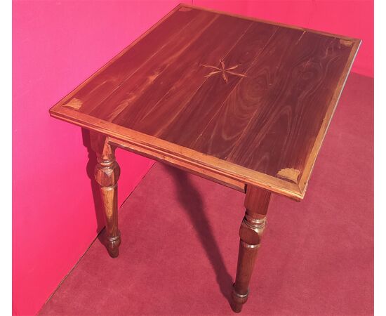 Coffee table with inlaid top and drawer