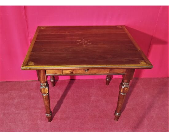 Coffee table with inlaid top and drawer