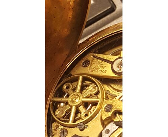 Cronografo in oro rosso 18 K.
