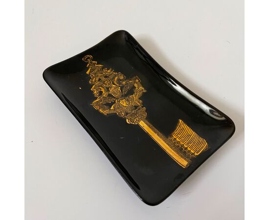 FORNASETTI, Large tray ashtray with key on black background     