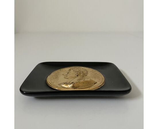 FORNASETTI, Tray-shaped ashtray with Roman coin decoration     